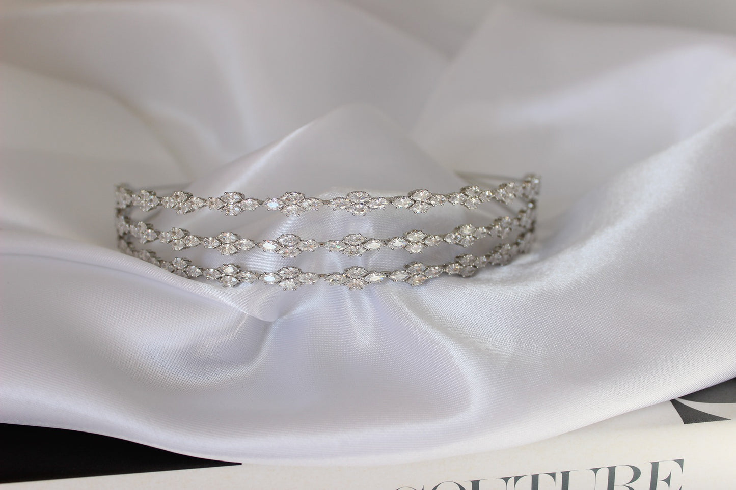 Silver bridal headband on white background