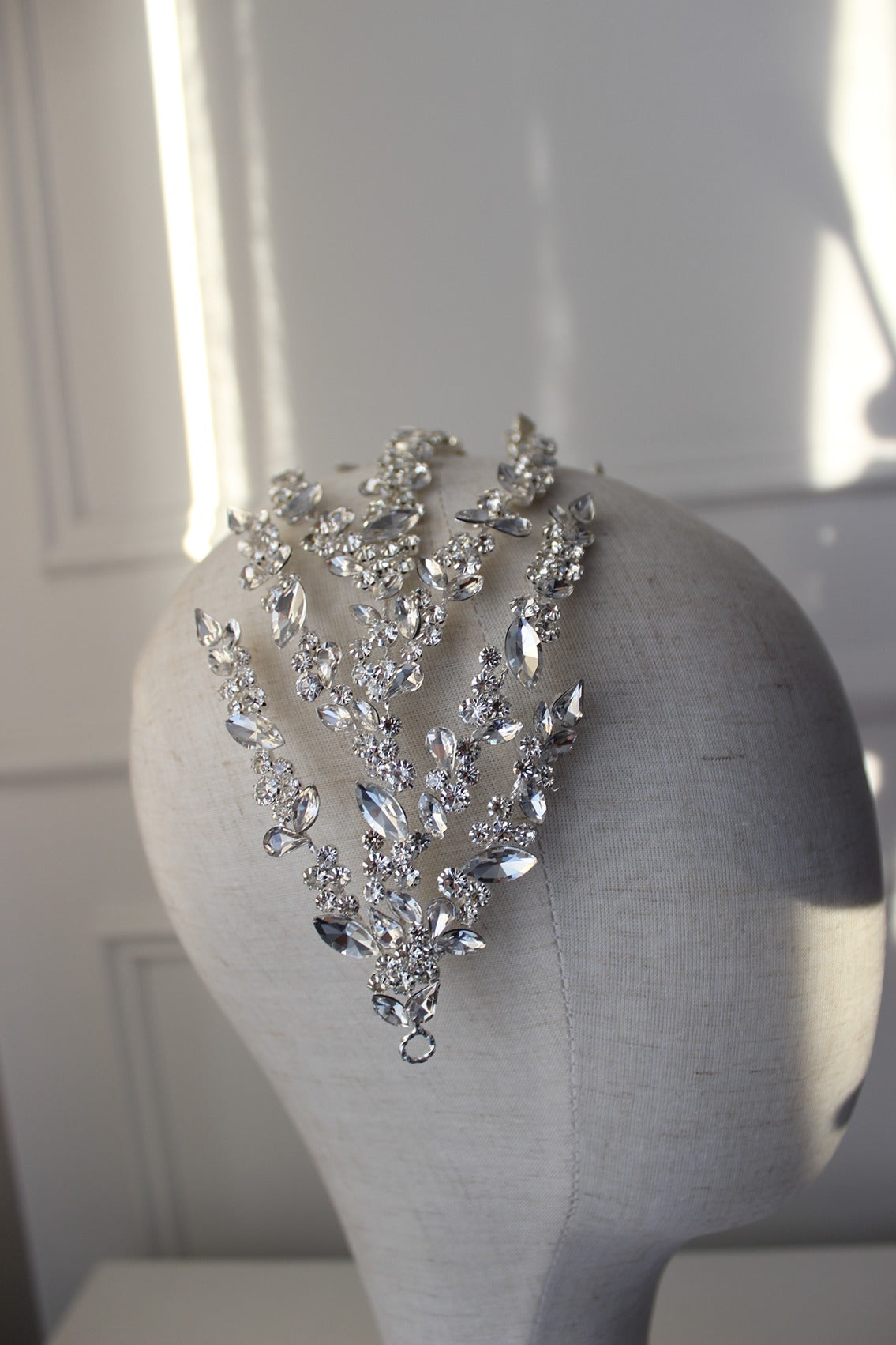 Silver bridal headpiece on mannequin