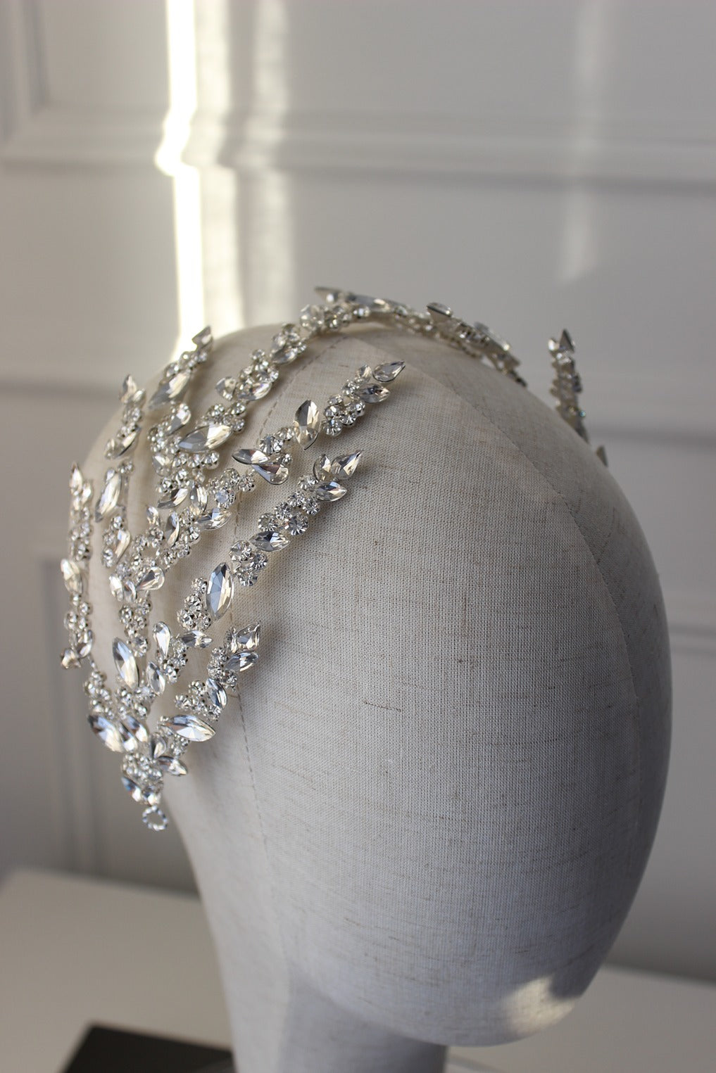 Silver bridal headpiece on mannequin