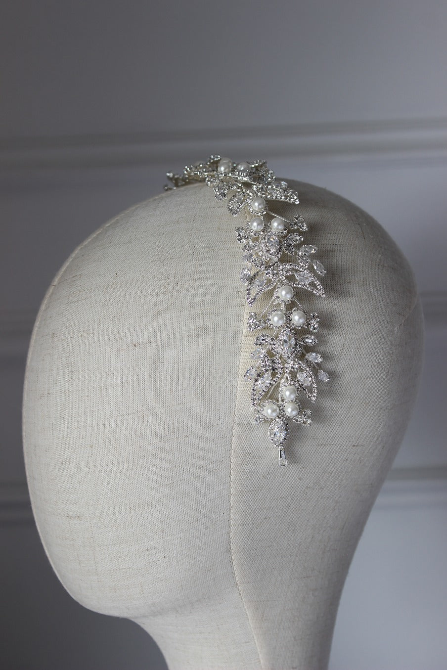 Silver bridal headpiece on mannequin