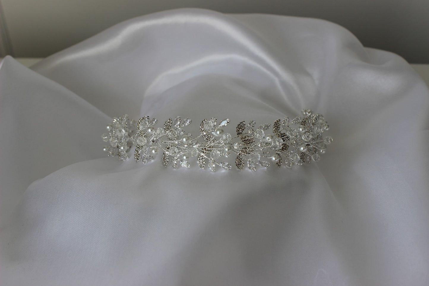 Silver bridal headpiece on white background
