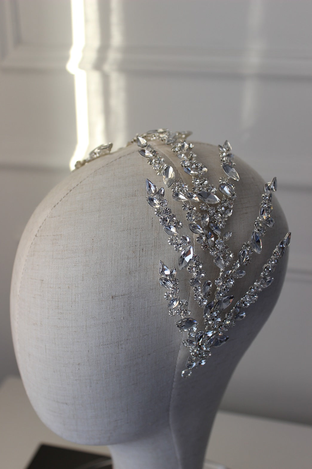 Silver bridal headpiece on mannequin