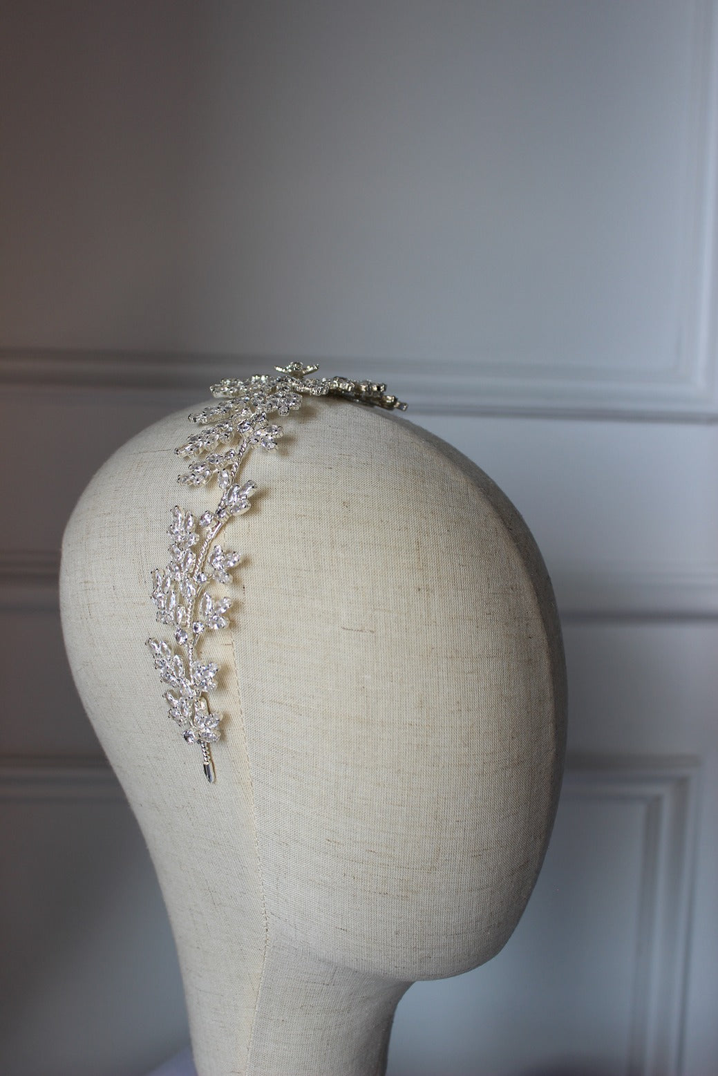 Silver bridal headpiece on mannequin