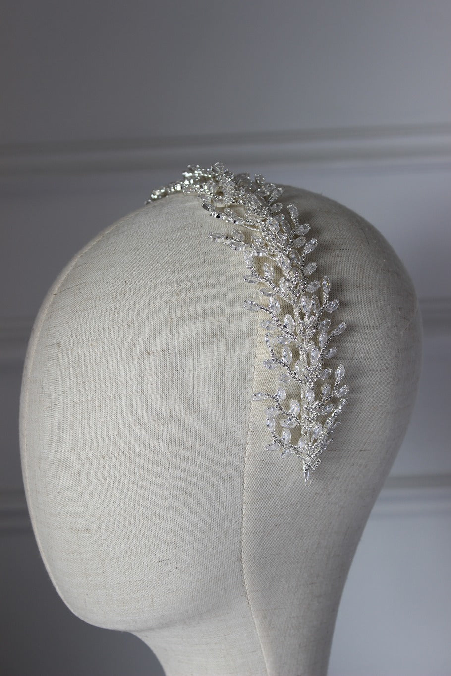 Silver bridal headpiece on mannequin