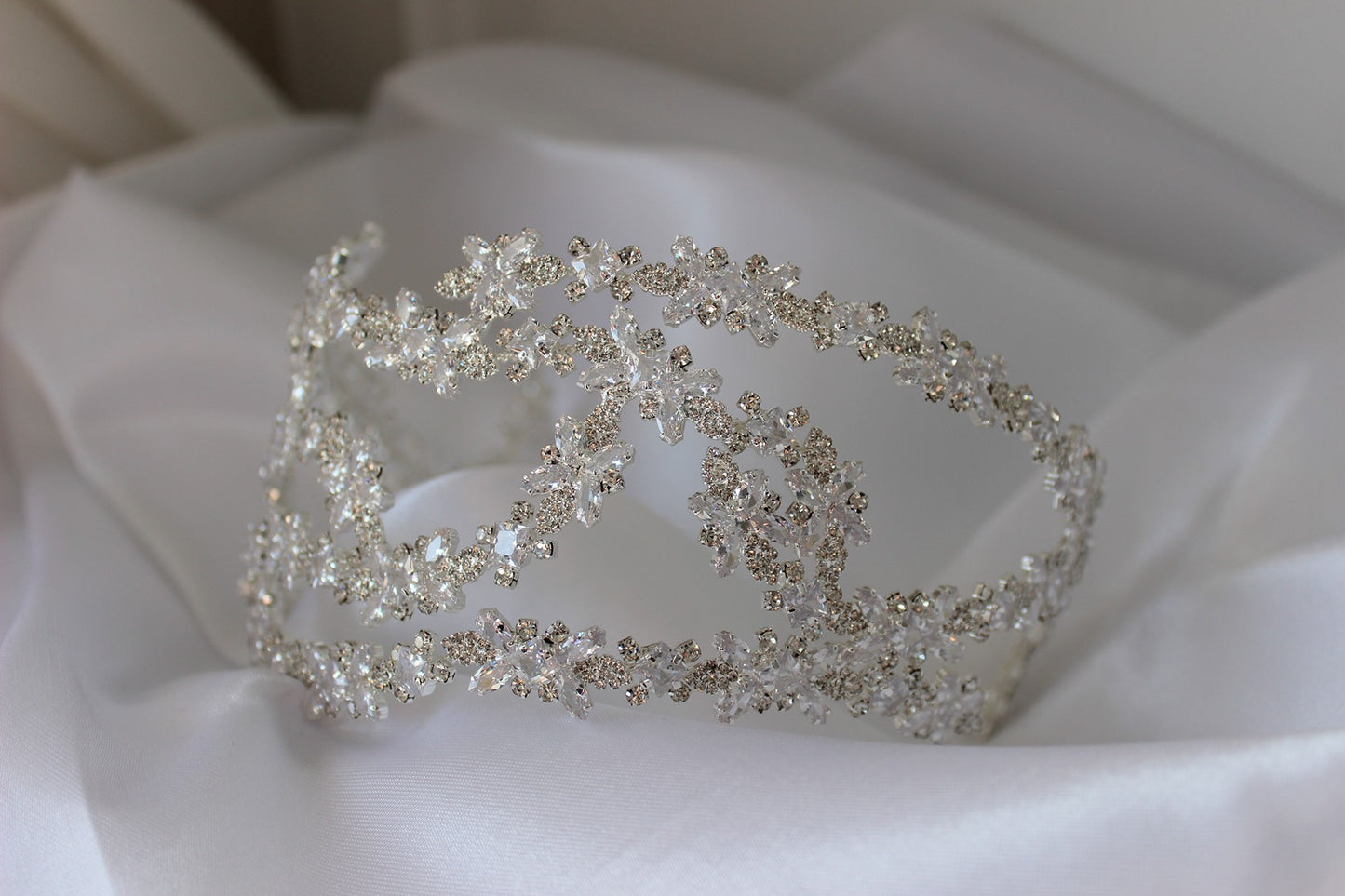 silver bridal headpiece on white background
