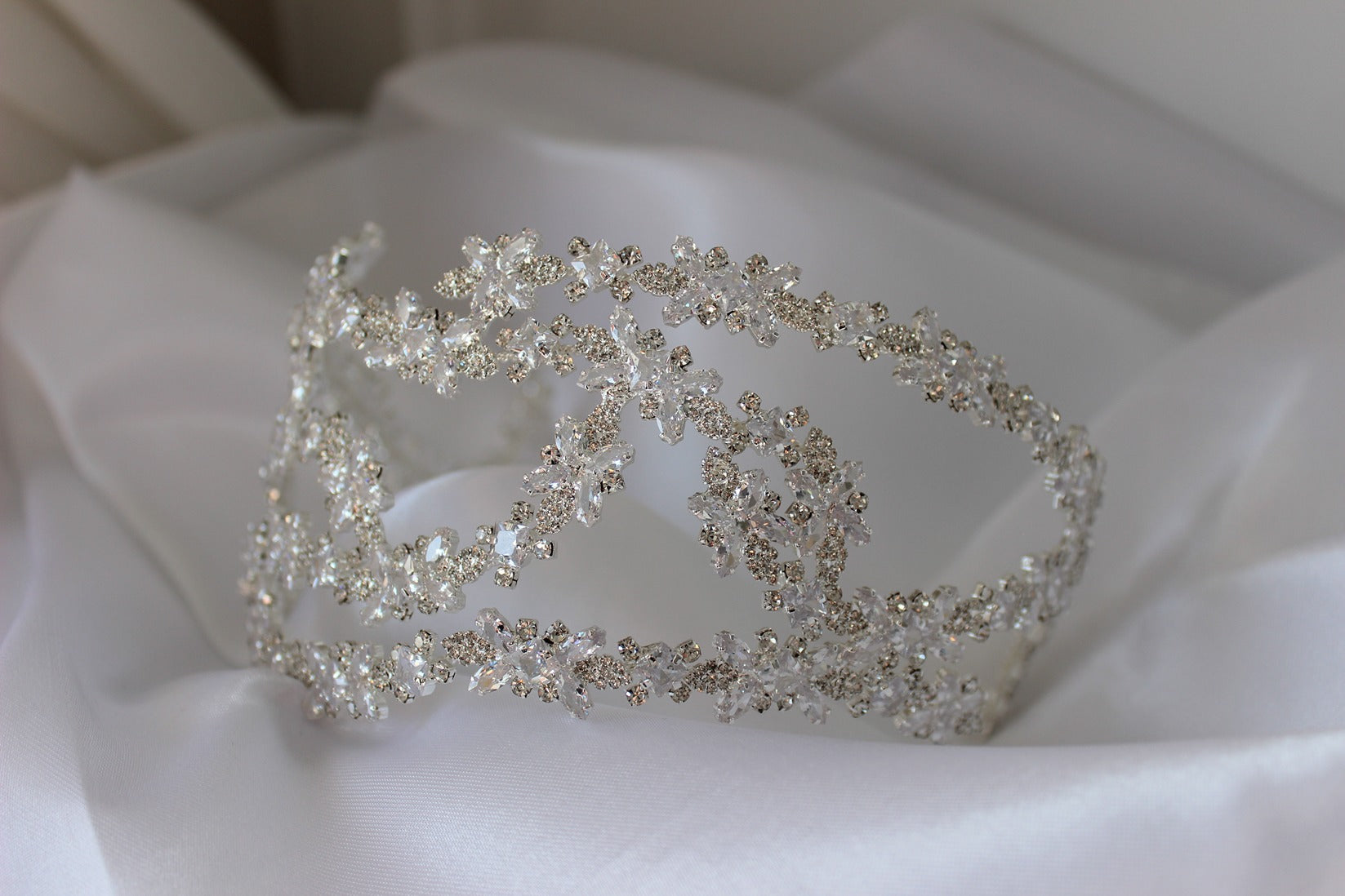 silver bridal headpiece on white background