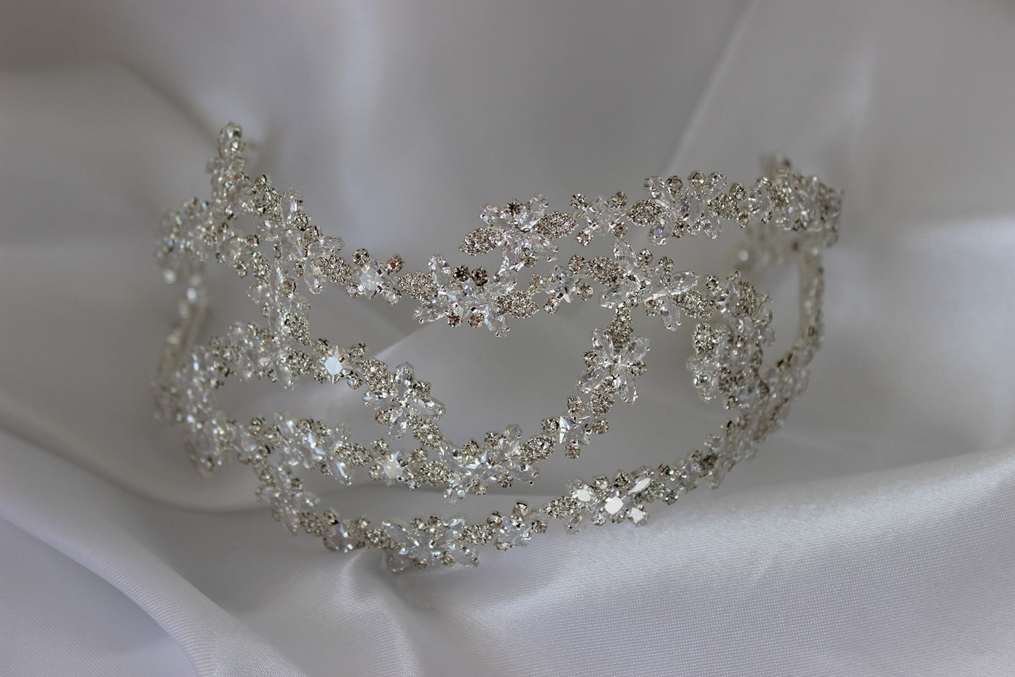 silver bridal headpiece on white background