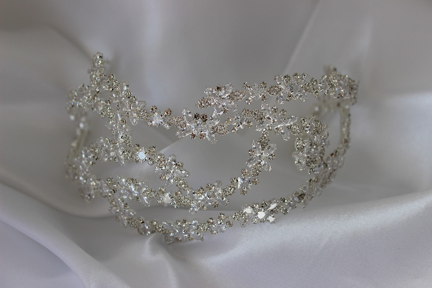 silver bridal headpiece on white background