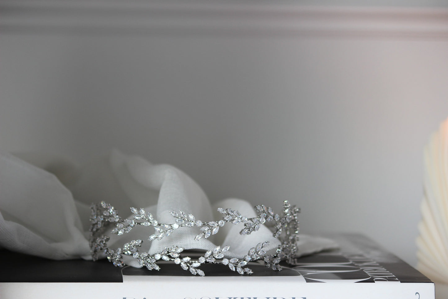 silver bridal headpiece on white background