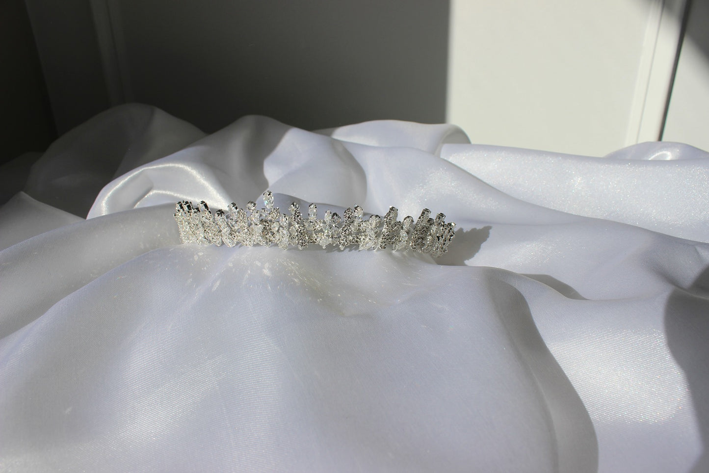 Silver bridal tiara on white background