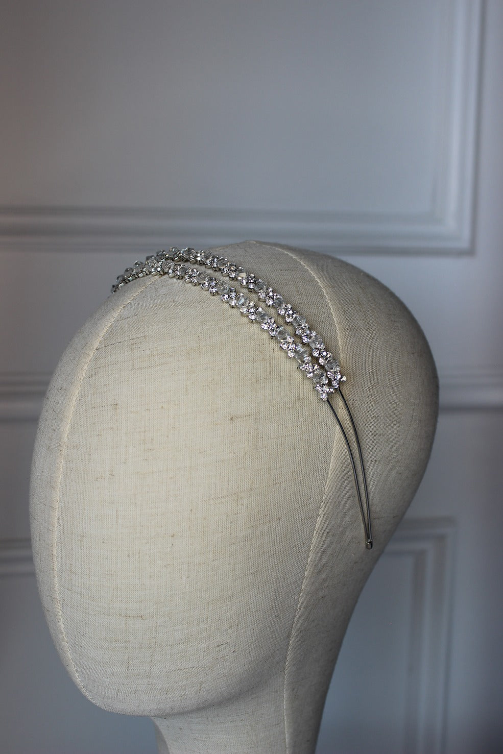 Silver flowergirl headband on mannequin