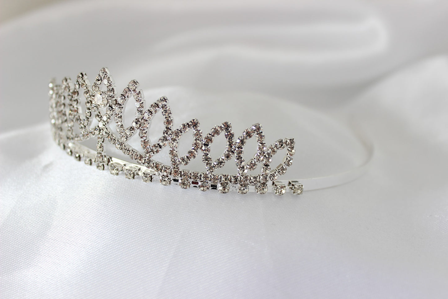 Silver flowergirl tiara on white background