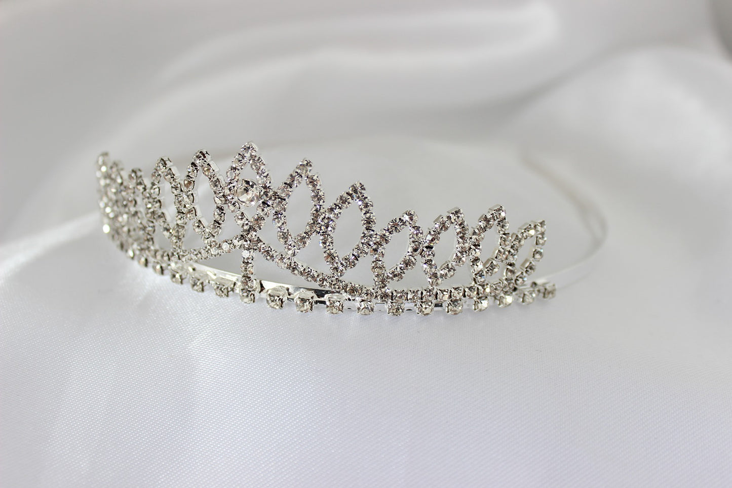 Silver flowergirl tiara on white background