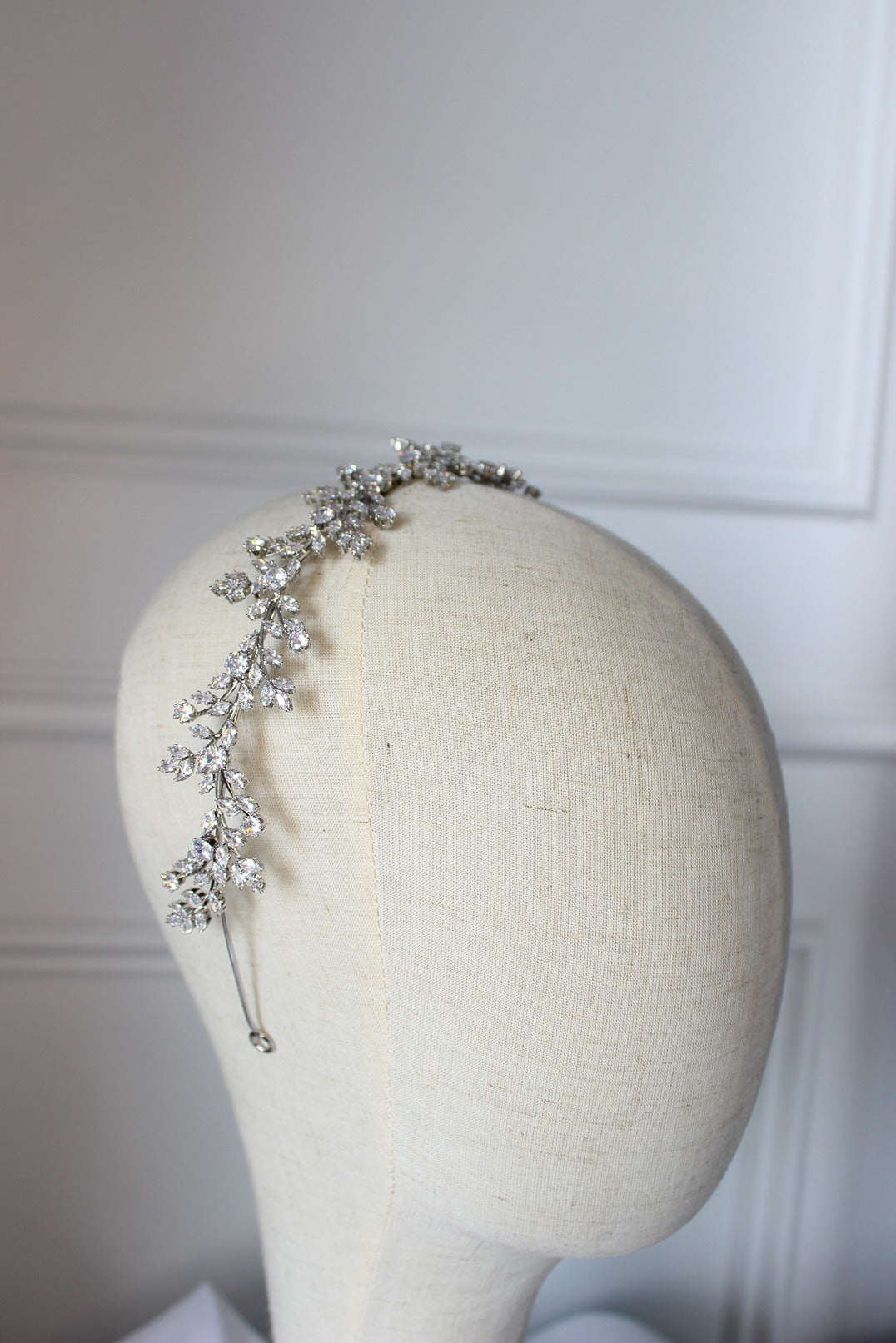 silver headband on mannequin