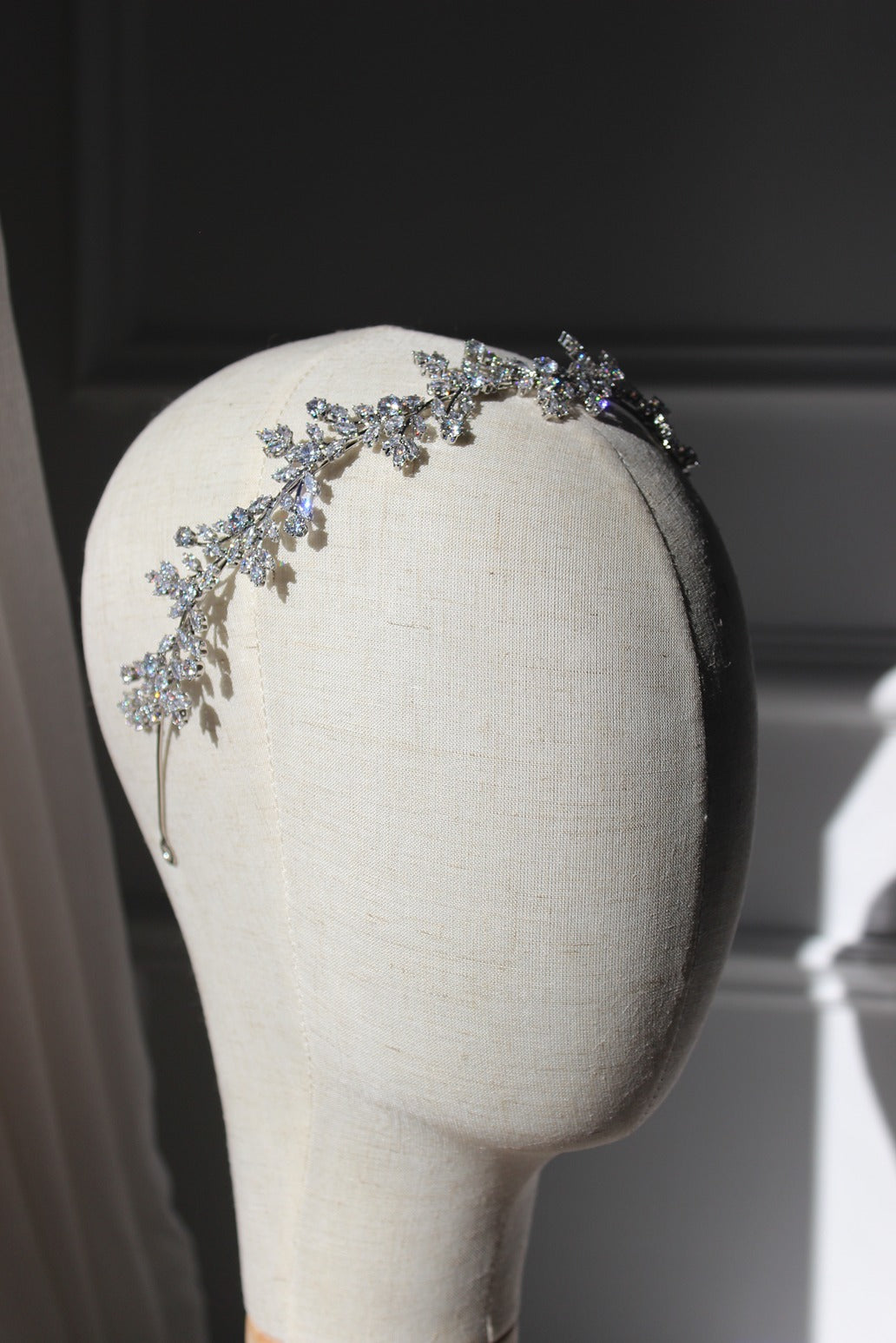 silver headband on mannequin