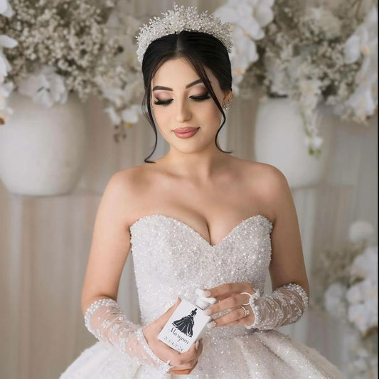 Bride wearing pearl silver bridal crown